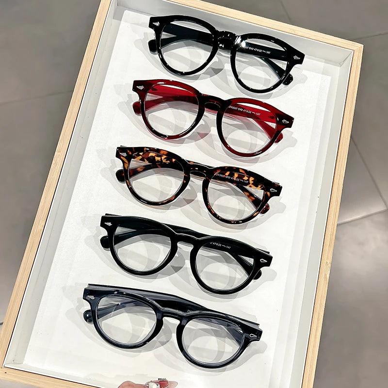 A high-end, retro Korean-style round frame anti-blue light flat glasses with a simple round frame and rice studs without makeup